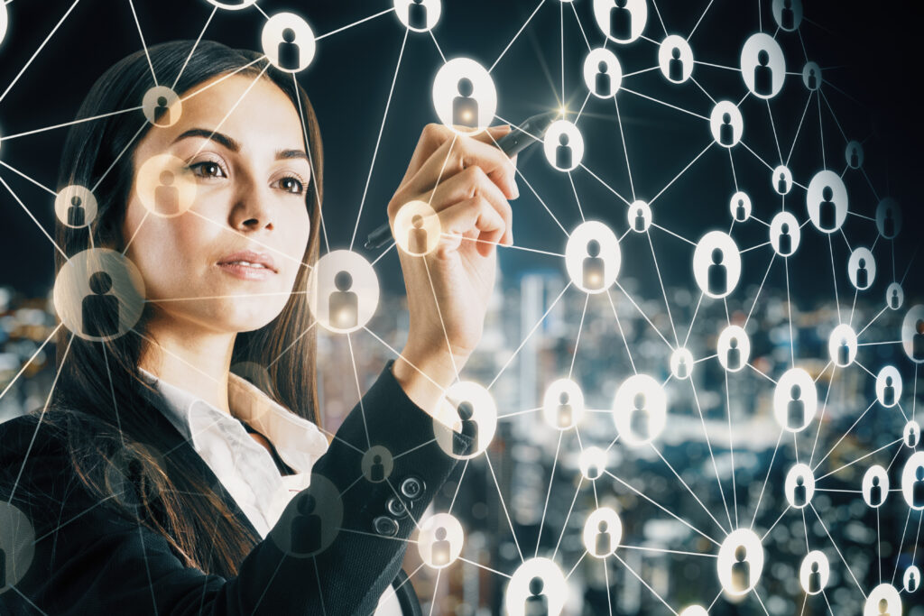 A businesswoman interacts with a network of connected profiles, visually representing lead generation.